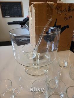 Complete vintage West Virginia Glass punch bowl set with original box. Has 14