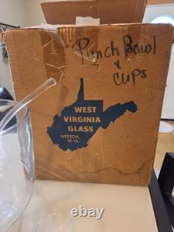 Complete vintage West Virginia Glass punch bowl set with original box. Has 14