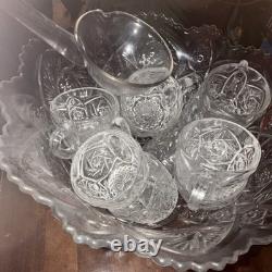 Hobstar cut glass, punch bowl, 12 cups and ladle. 14 piece